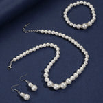 Smyckeset med pärlor – halsband, armband & örhängen