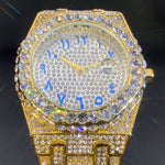 Magnus-kello (miesten kultainen kello, jossa on strassikiviä ja päivämääränäyttö)