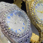 Magnus-kello (miesten kultainen kello, jossa on strassikiviä ja päivämääränäyttö)